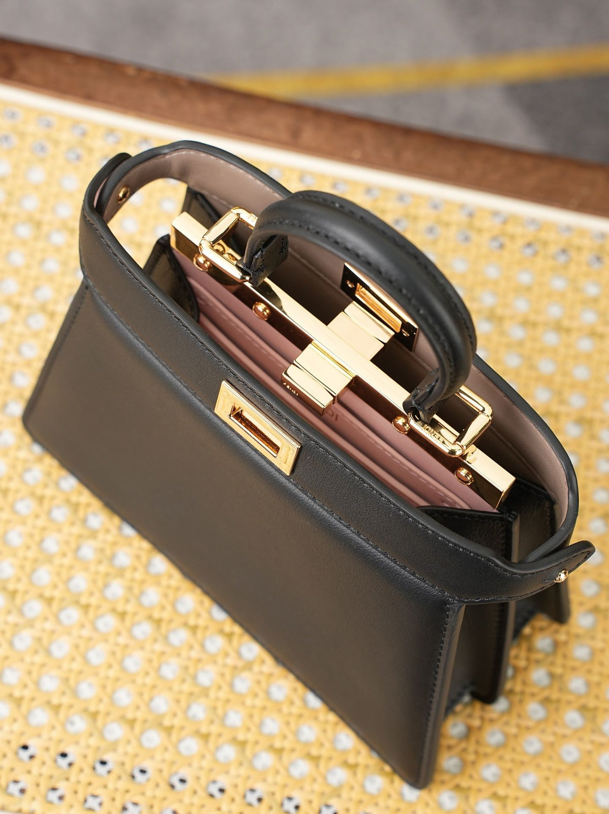 Model 8005, small size 20*11*15cm, FE ND1 "peekaboo I see u" handbag. Brand new "peekaboo I see u" is designed to showcase your unique side. The new style continues the classic trapezoidal silhouette and square twist lock design of the original "peekaboo"
