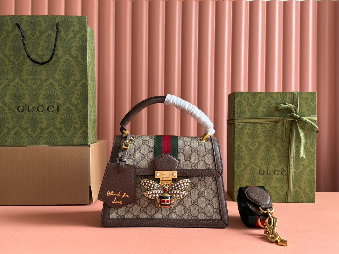 Equipped with a full set of classic Gucci packaging, featuring Marguerite details paired with the brand's emerging signature elements, the Queen Margaret series of bags are crafted from GG premium synthetic canvas. This versatile material still plays a