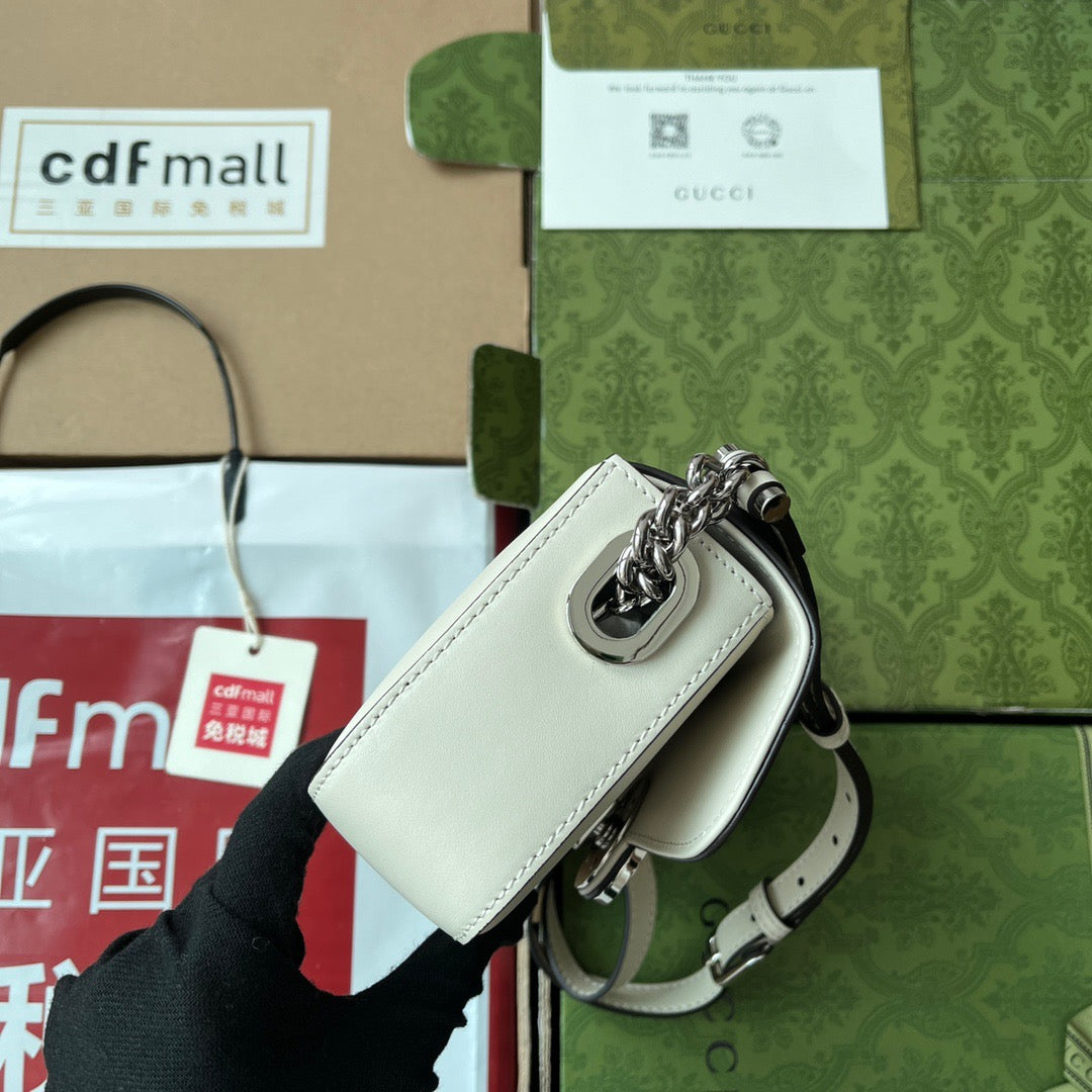 Original leather matching (Cdfmall Sanya Duty Free Shop handbag Petite GG series mini shoulder bag) This Petite GG series mini shoulder bag features a soft yet structured design, paired with a top zipper closure and cleverly integrated double G elements
