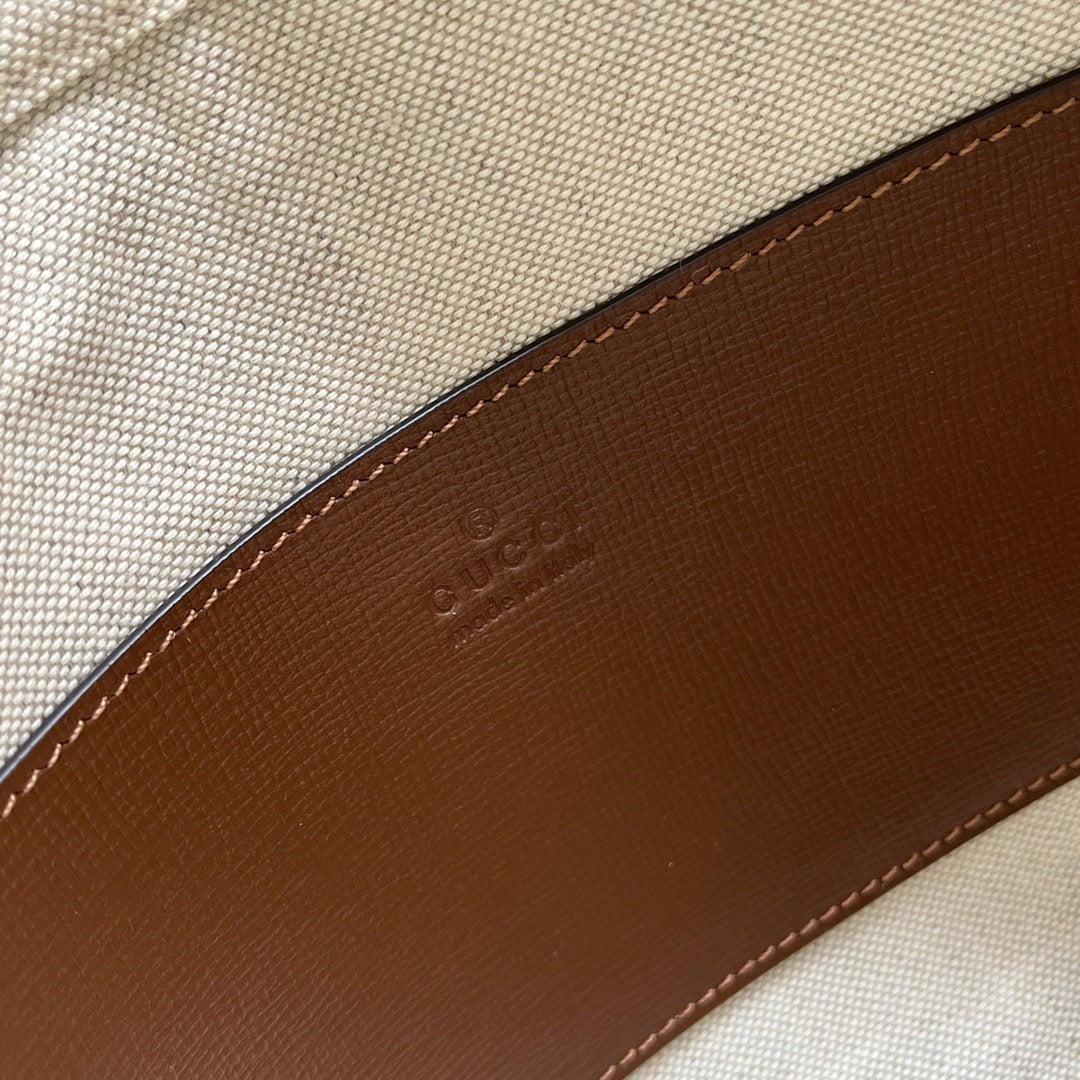 Original leather matching (fmall Sanya Duty Free Shop handbag HUH9G 8546, featuring timeless materials, color and house code combined, injecting a vintage feel into the style. This beige and ebony canvas small backpack, adorned with brown leather, is