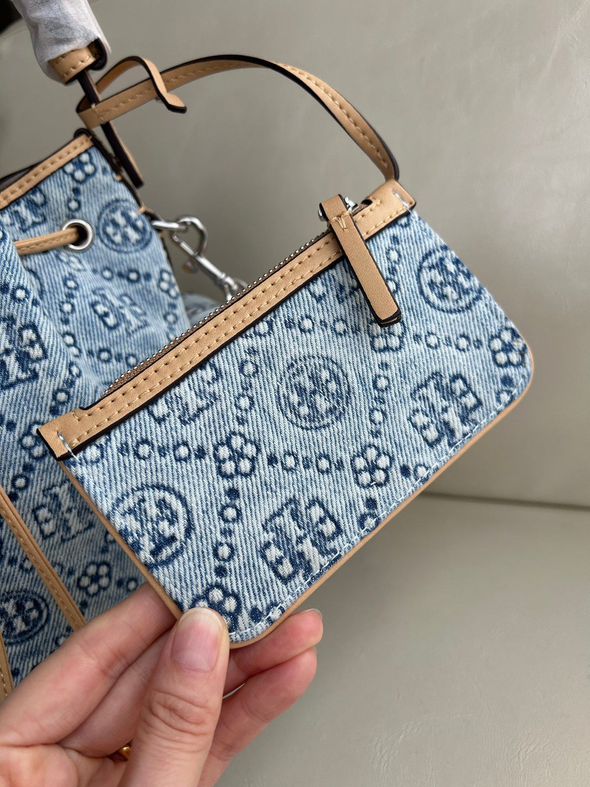 Tory Burch's classic T Monogram collection denim denim material paired with iconic patterns