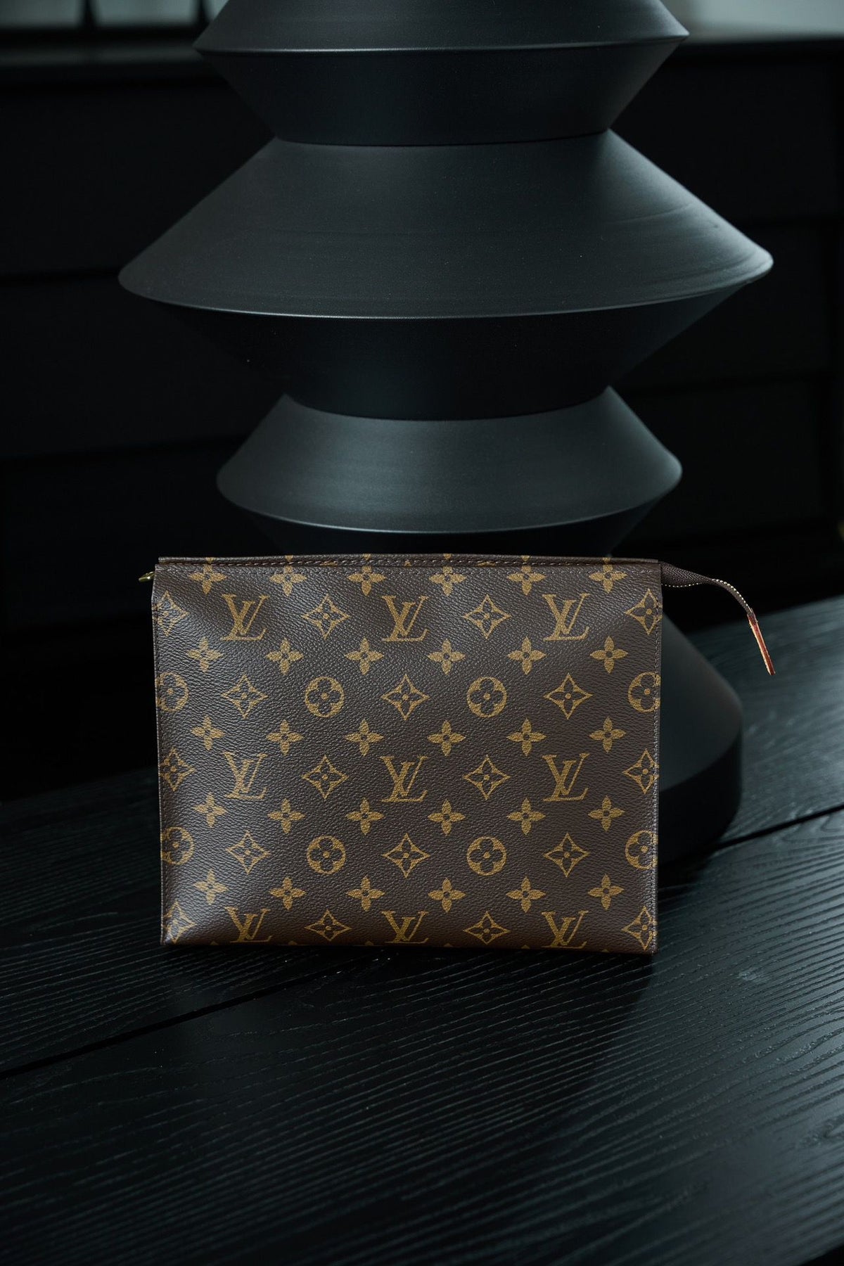 M47542 Toiletry Bag, made of original diamond pattern floral fabric, with fully steel vacuum plated hardware, priced at 980