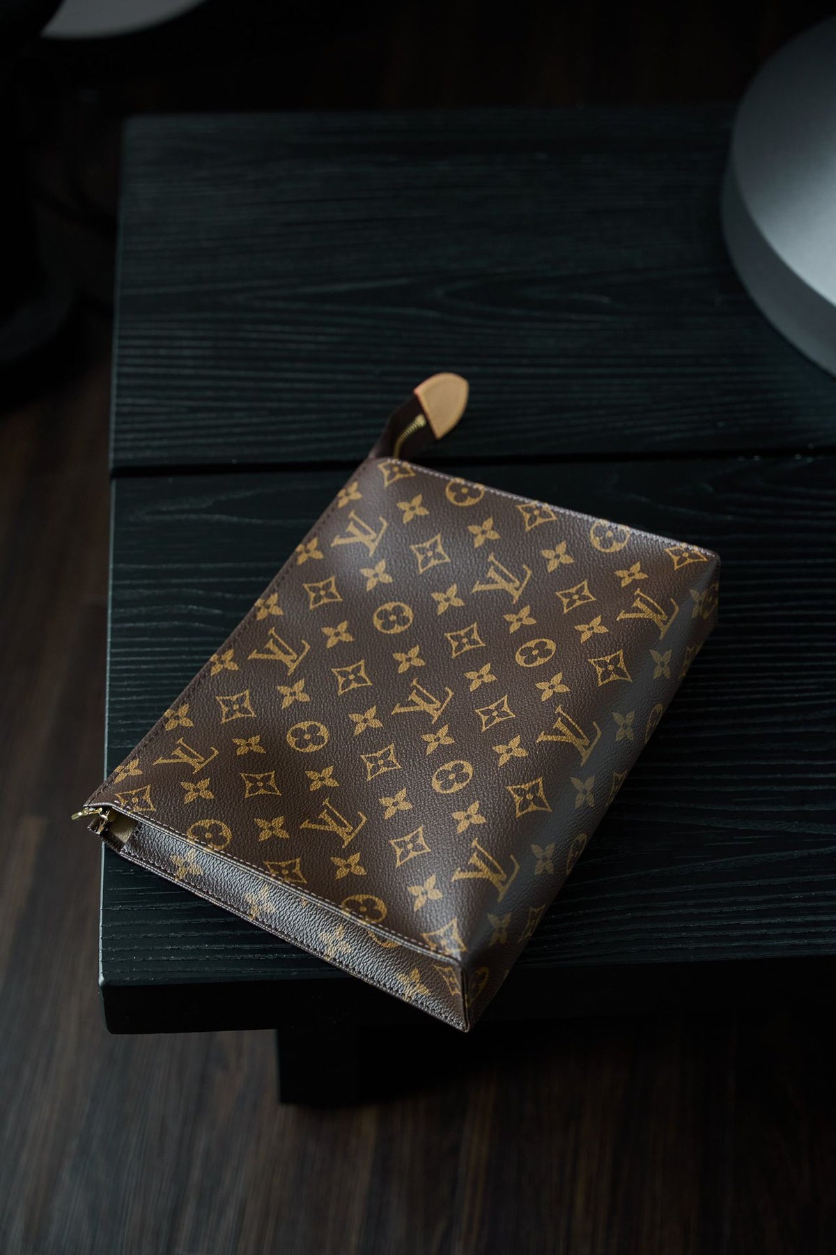 M47542 Toiletry Bag, made of original diamond pattern floral fabric, with fully steel vacuum plated hardware, priced at 980