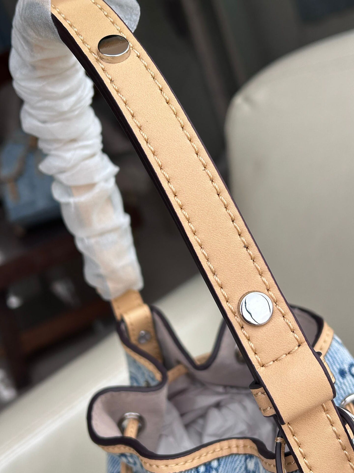 Tory Burch's classic T Monogram collection denim denim material paired with iconic patterns