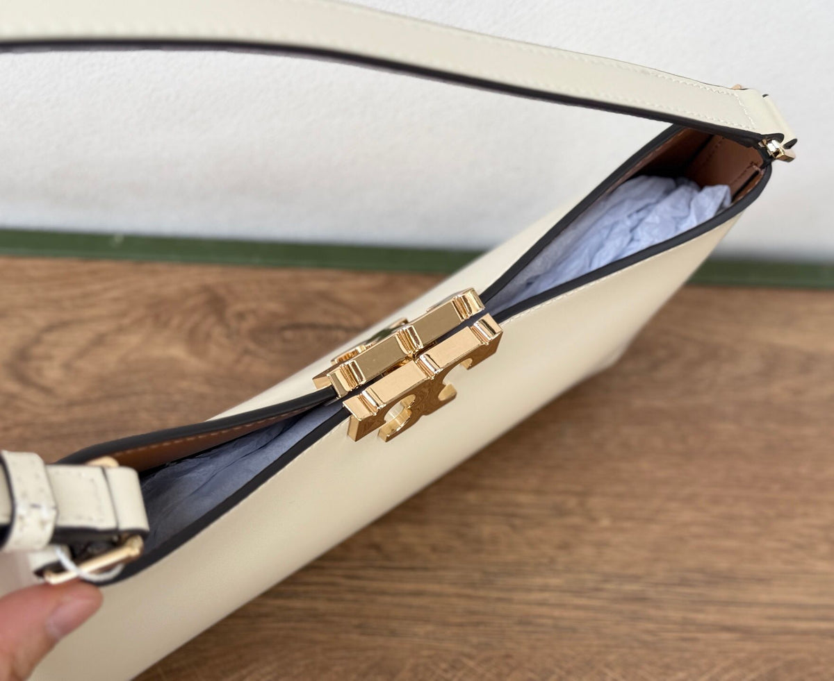 TORY BURCH ELEANOR SLIM SHOULDER BAG New armpit bag Rocket bag has ultra-thin size, upper back is not cumbersome, and it can hold necessities. It is suitable for different occasions. Pure steel hardware magnetic tape opening and closing design. The first