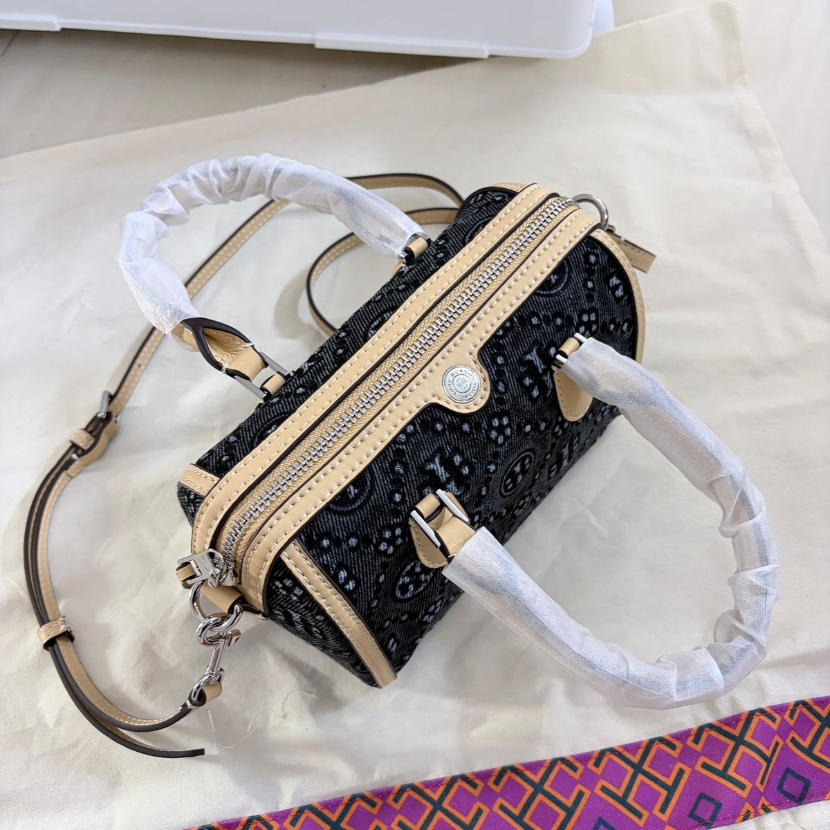 Tory Burch's T-Monogram collection of vintage Boston bags is often referred to as mini barrel bags or small handbags