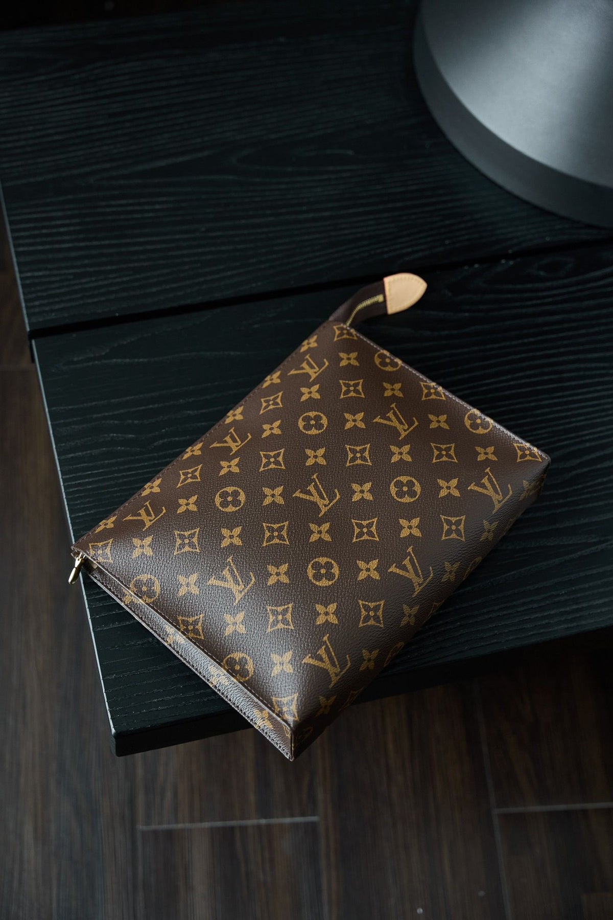 M47542 Toiletry Bag, made of original diamond pattern floral fabric, with fully steel vacuum plated hardware, priced at 980