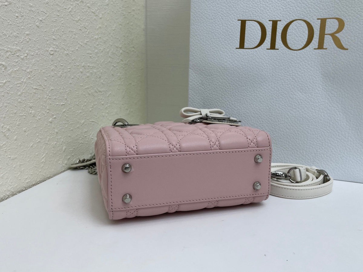 Bow Lady Dior Triple Check The classic Lady Dior bag epitomizes Dior's deep insight into elegance and beauty. Carefully crafted with cannage topstitching to create eye-catching quilting details. Elegant and timeless design. D.I.O.R. charm in silver-finish
