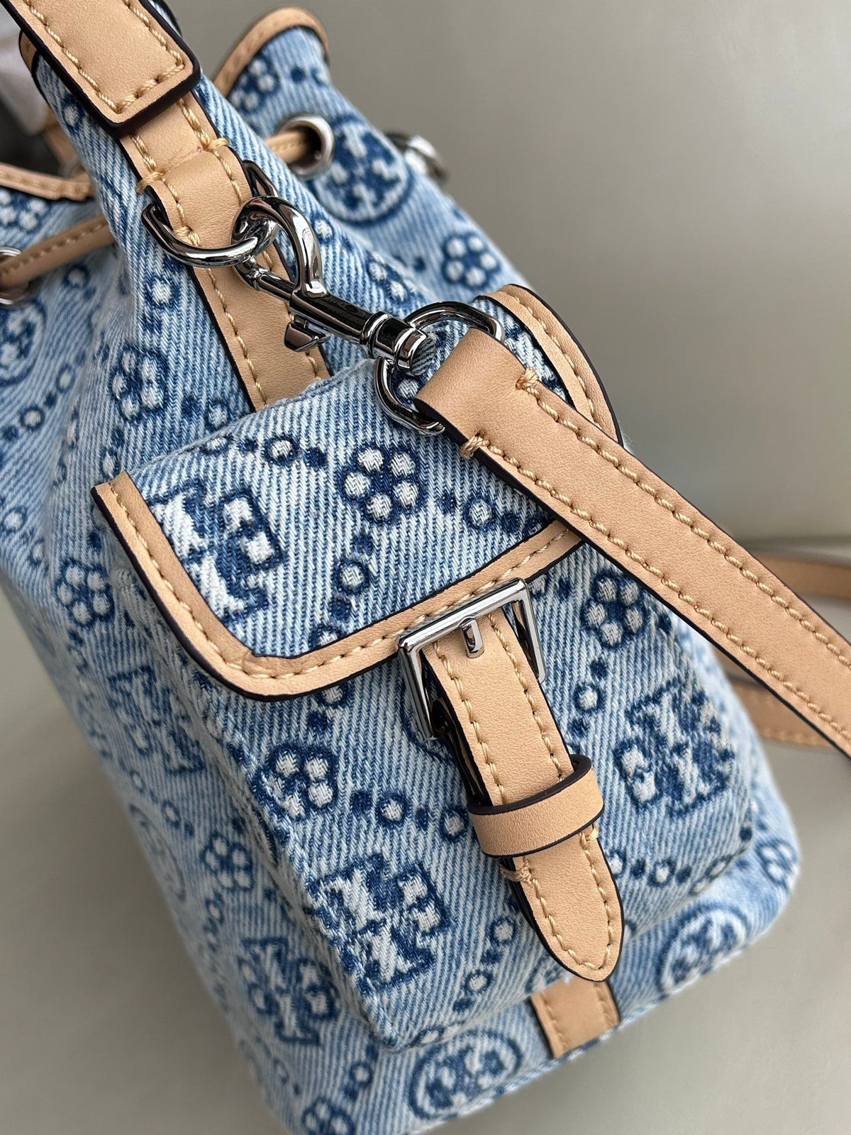 Tory Burch's classic T Monogram collection denim denim material paired with iconic patterns