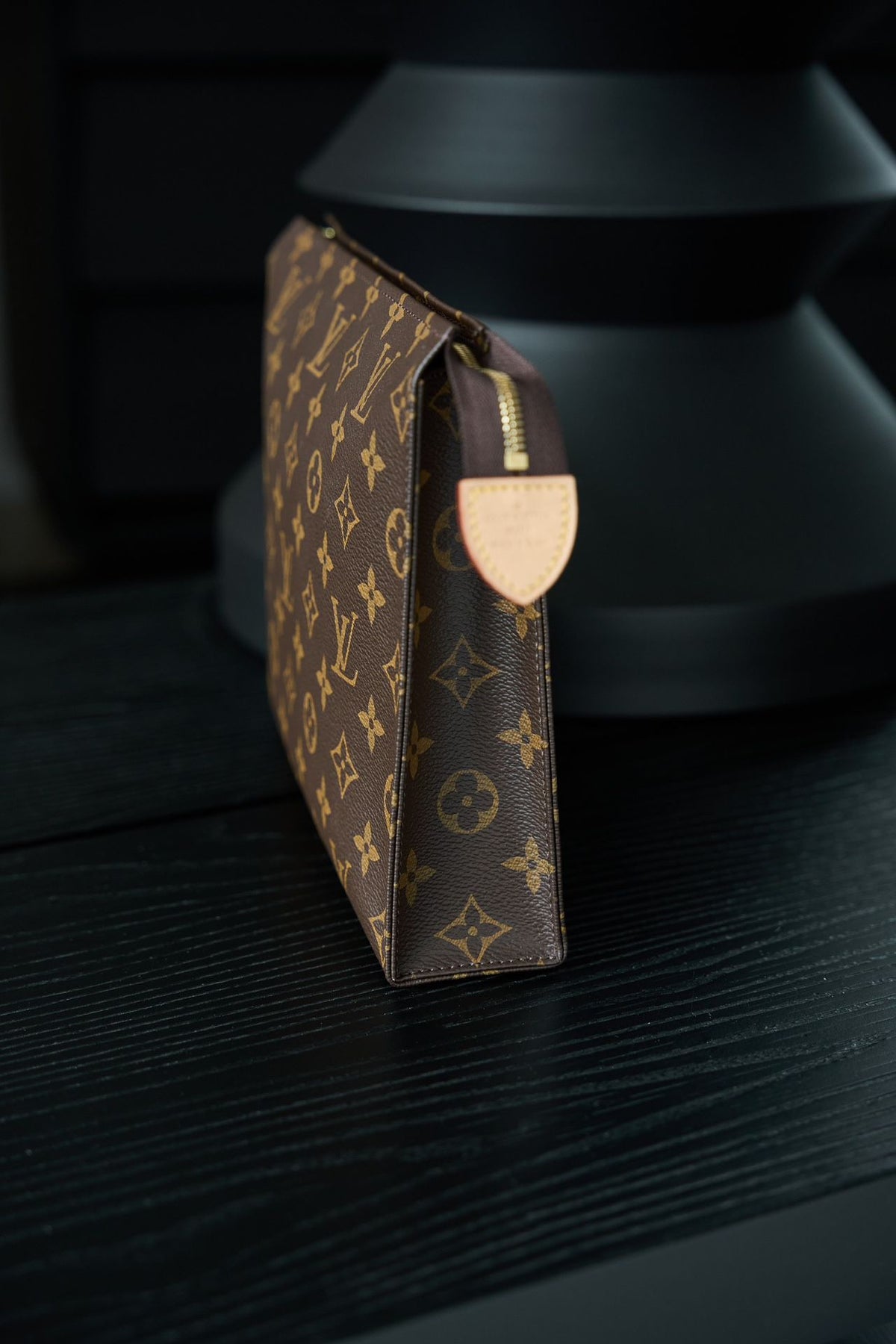 M47542 Toiletry Bag, made of original diamond pattern floral fabric, with fully steel vacuum plated hardware, priced at 980