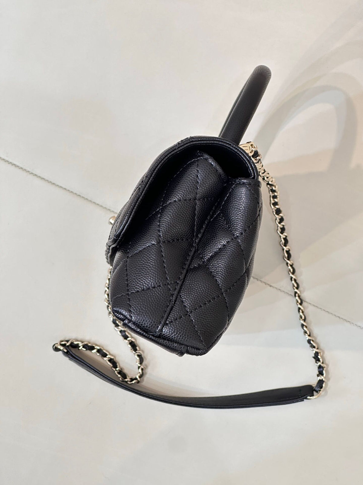 Black Quilted Top Handle Bag with Chain Strap