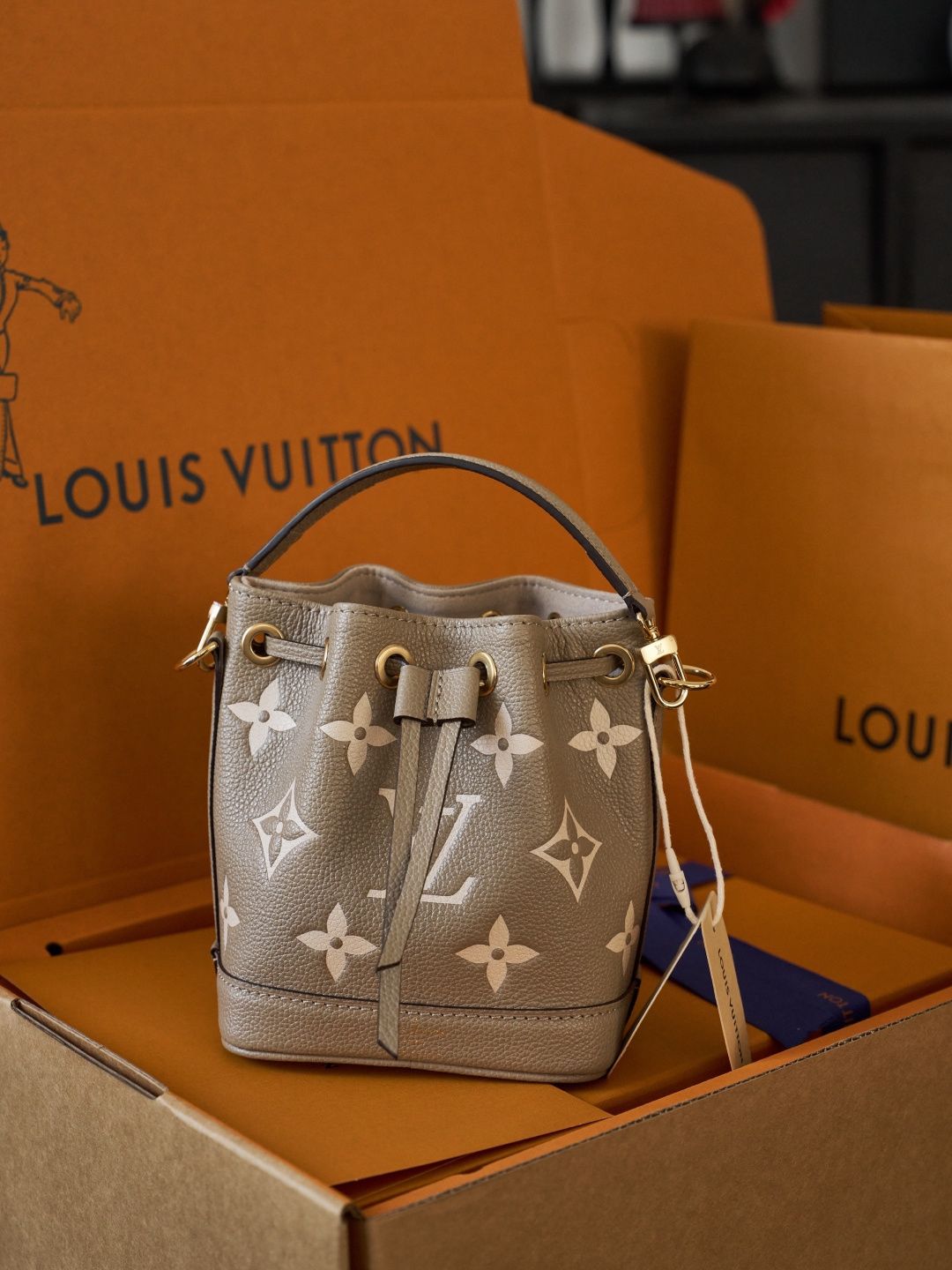 Taupe Monogram Drawstring Bucket Bag with Top Handle