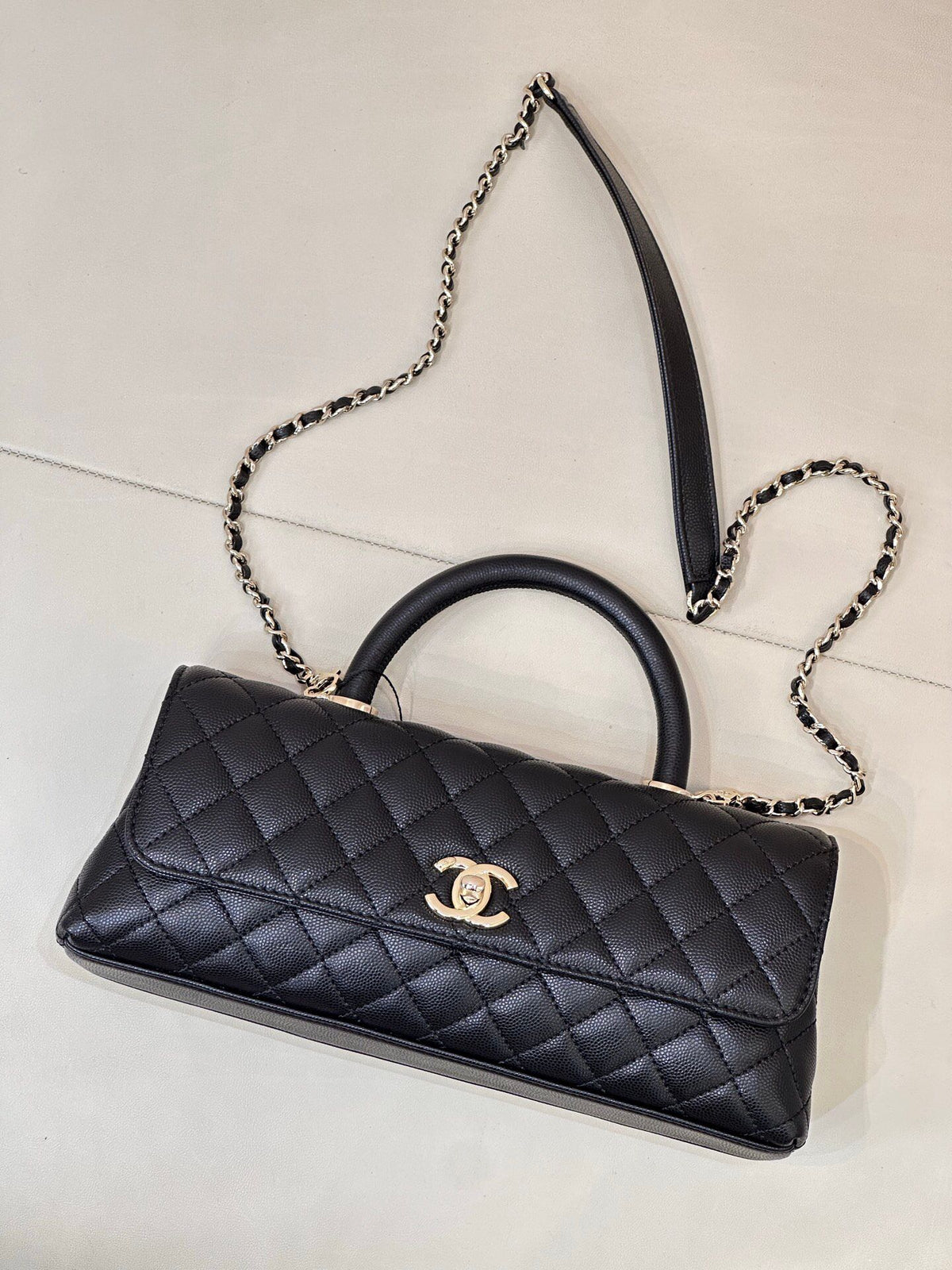 Black Quilted Top Handle Bag with Chain Strap