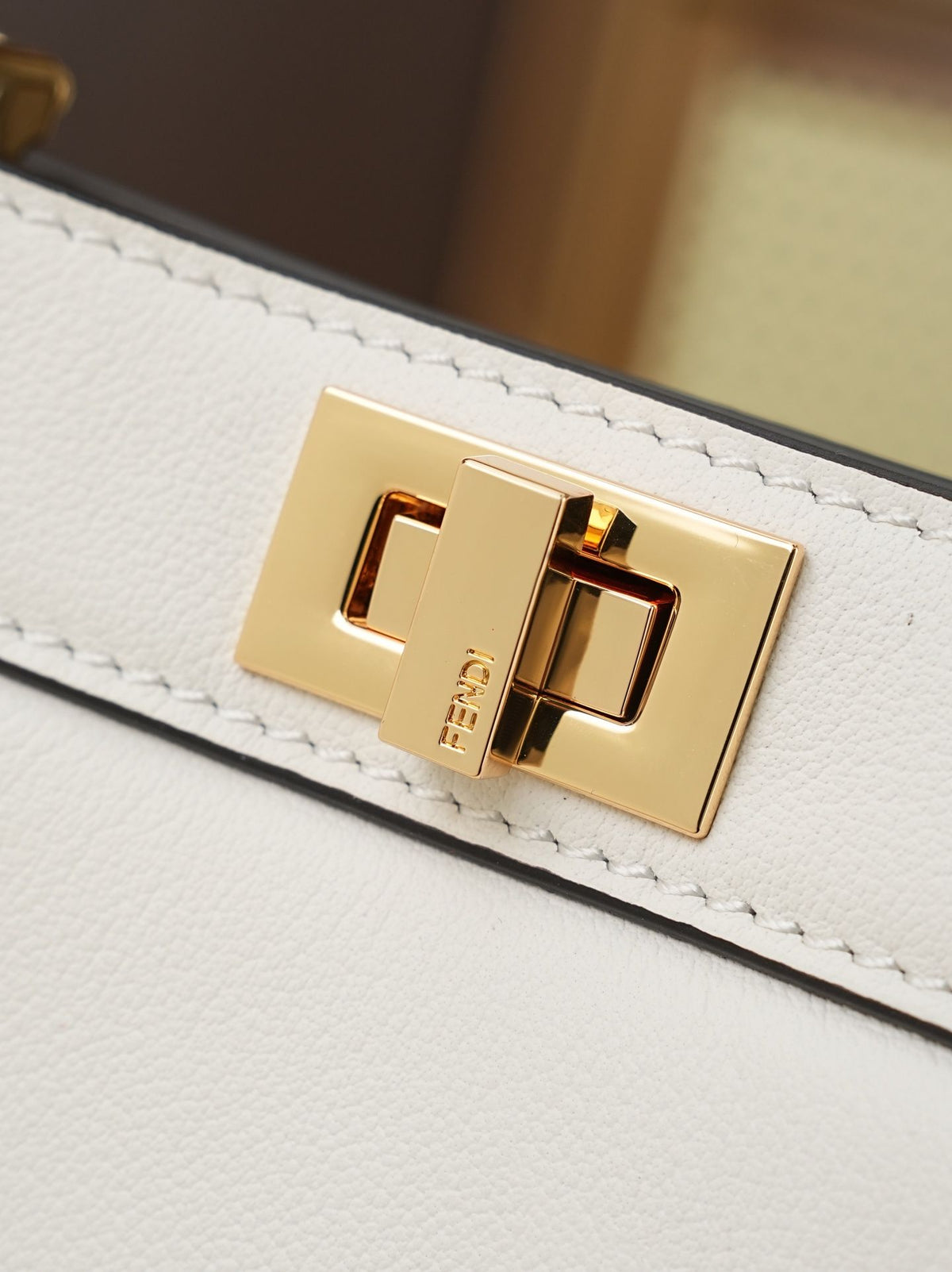 Model 8005, small size 20*11*15cm, FE ND1 "peekaboo I see u" handbag. Brand new "peekaboo I see u" is designed to showcase your unique side. The new style continues the classic trapezoidal silhouette and square twist lock design of the original "peekaboo"