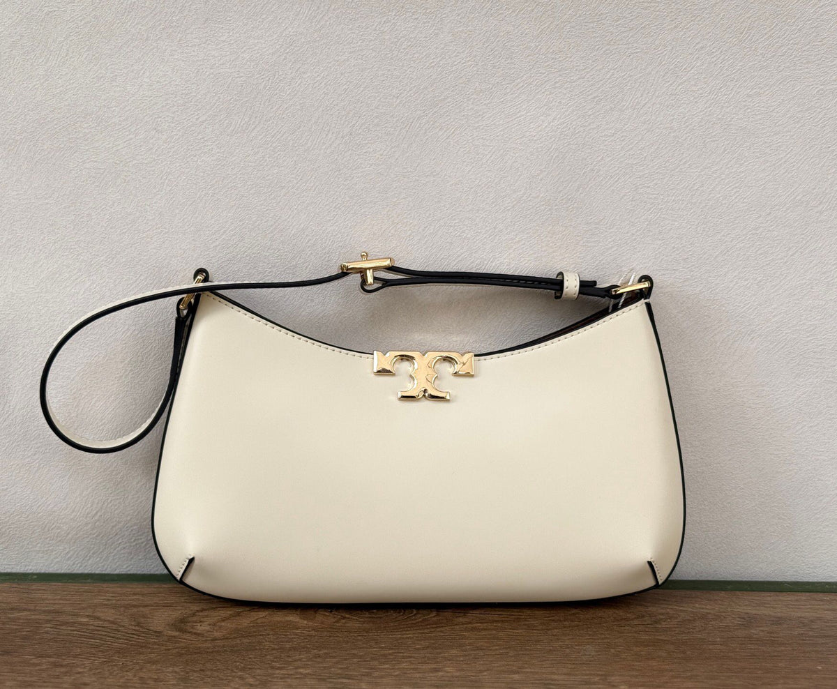 TORY BURCH ELEANOR SLIM SHOULDER BAG New armpit bag Rocket bag has ultra-thin size, upper back is not cumbersome, and it can hold necessities. It is suitable for different occasions. Pure steel hardware magnetic tape opening and closing design. The first
