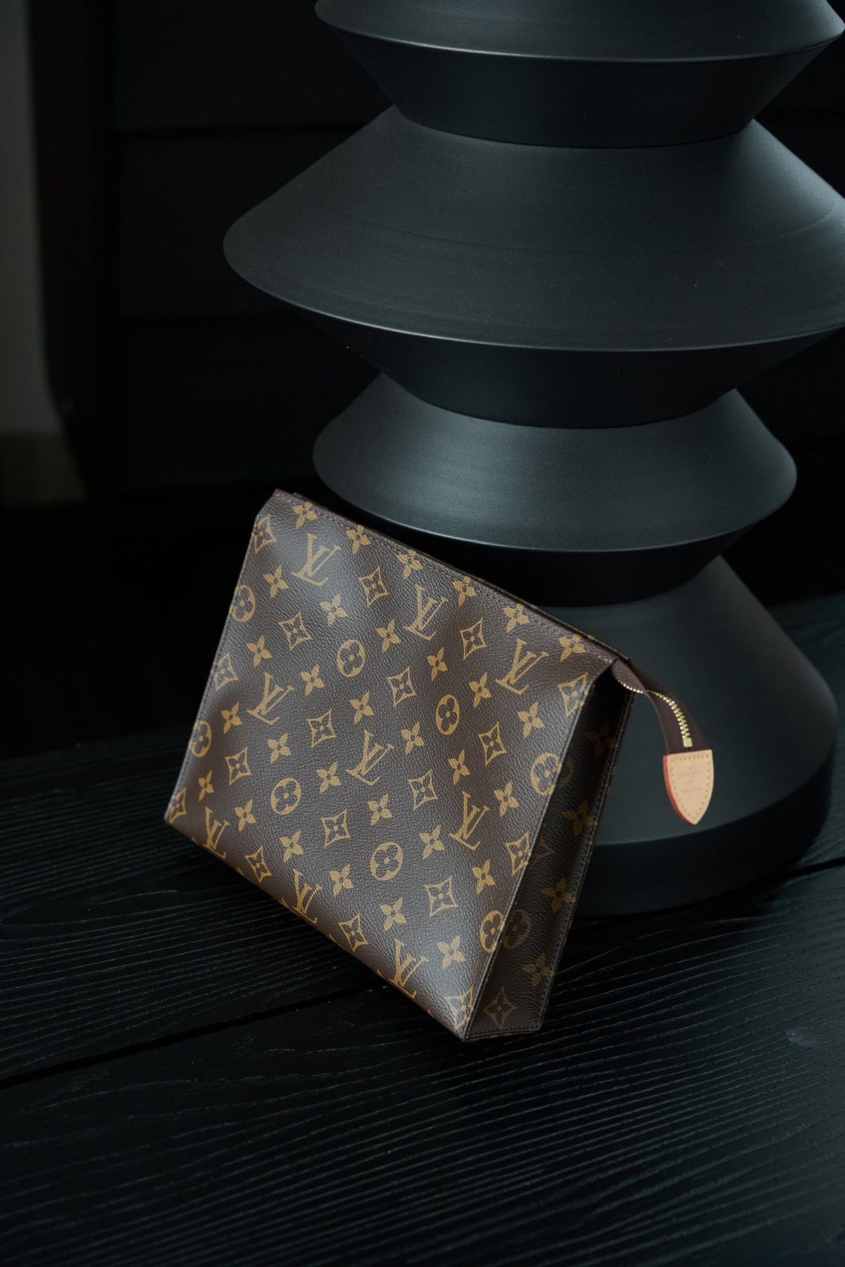 M47542 Toiletry Bag, made of original diamond pattern floral fabric, with fully steel vacuum plated hardware, priced at 980
