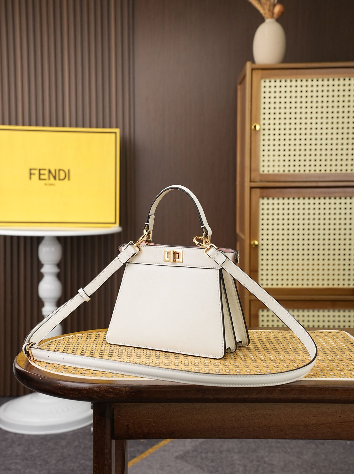 Model 8005, small size 20*11*15cm, FE ND1 "peekaboo I see u" handbag. Brand new "peekaboo I see u" is designed to showcase your unique side. The new style continues the classic trapezoidal silhouette and square twist lock design of the original "peekaboo"