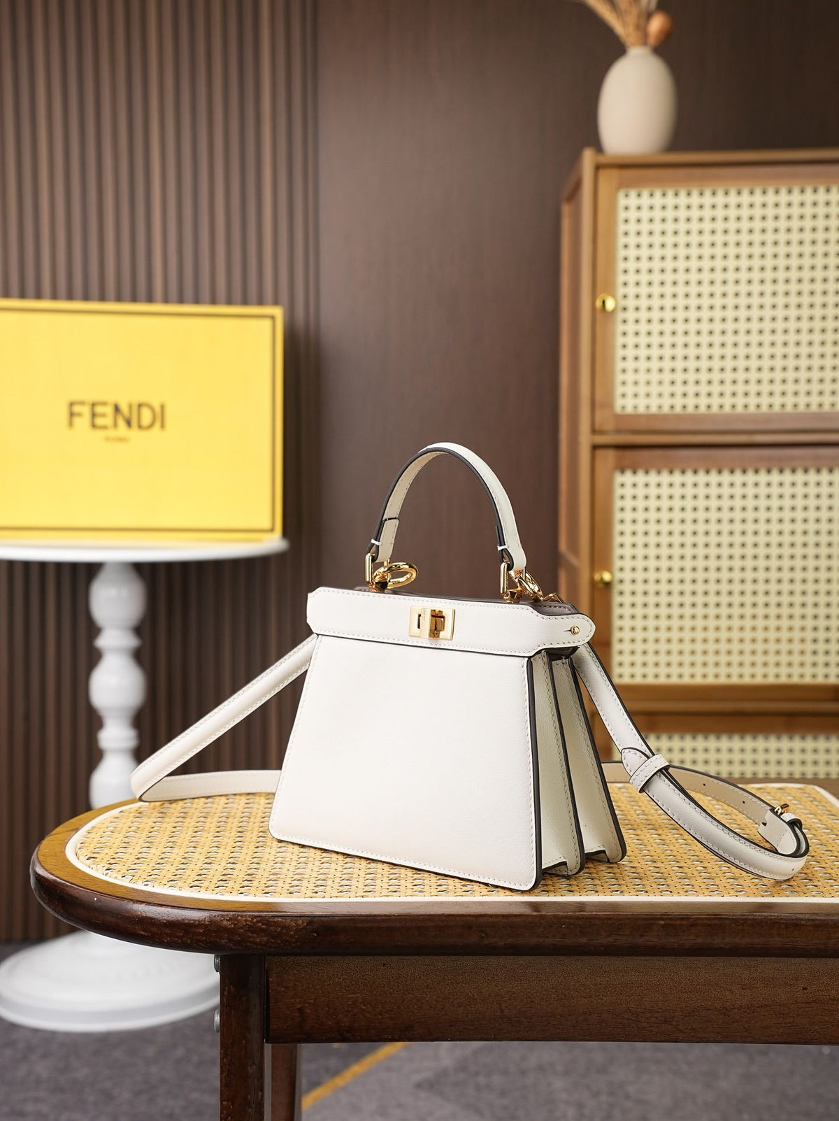 Model 8005, small size 20*11*15cm, FE ND1 "peekaboo I see u" handbag. Brand new "peekaboo I see u" is designed to showcase your unique side. The new style continues the classic trapezoidal silhouette and square twist lock design of the original "peekaboo"