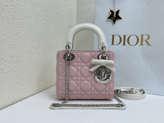 Bow Lady Dior Triple Check The classic Lady Dior bag epitomizes Dior's deep insight into elegance and beauty. Carefully crafted with cannage topstitching to create eye-catching quilting details. Elegant and timeless design. D.I.O.R. charm in silver-finish