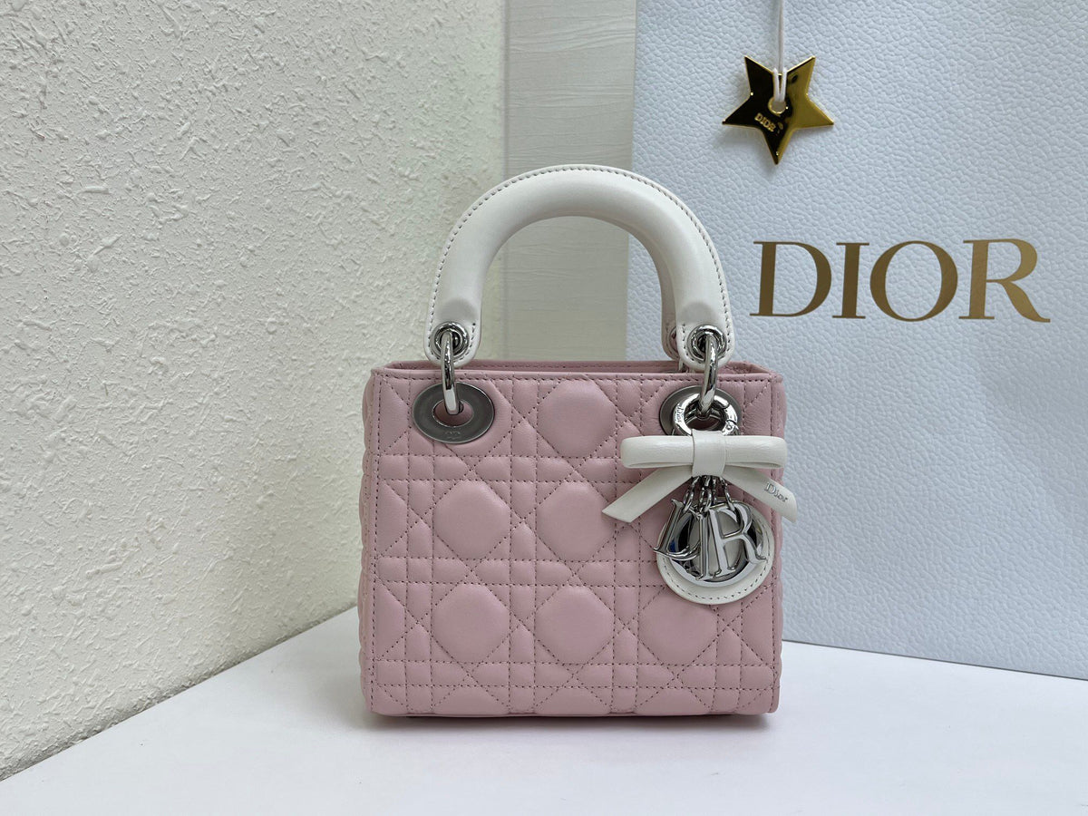 Bow Lady Dior Triple Check The classic Lady Dior bag epitomizes Dior's deep insight into elegance and beauty. Carefully crafted with cannage topstitching to create eye-catching quilting details. Elegant and timeless design. D.I.O.R. charm in silver-finish