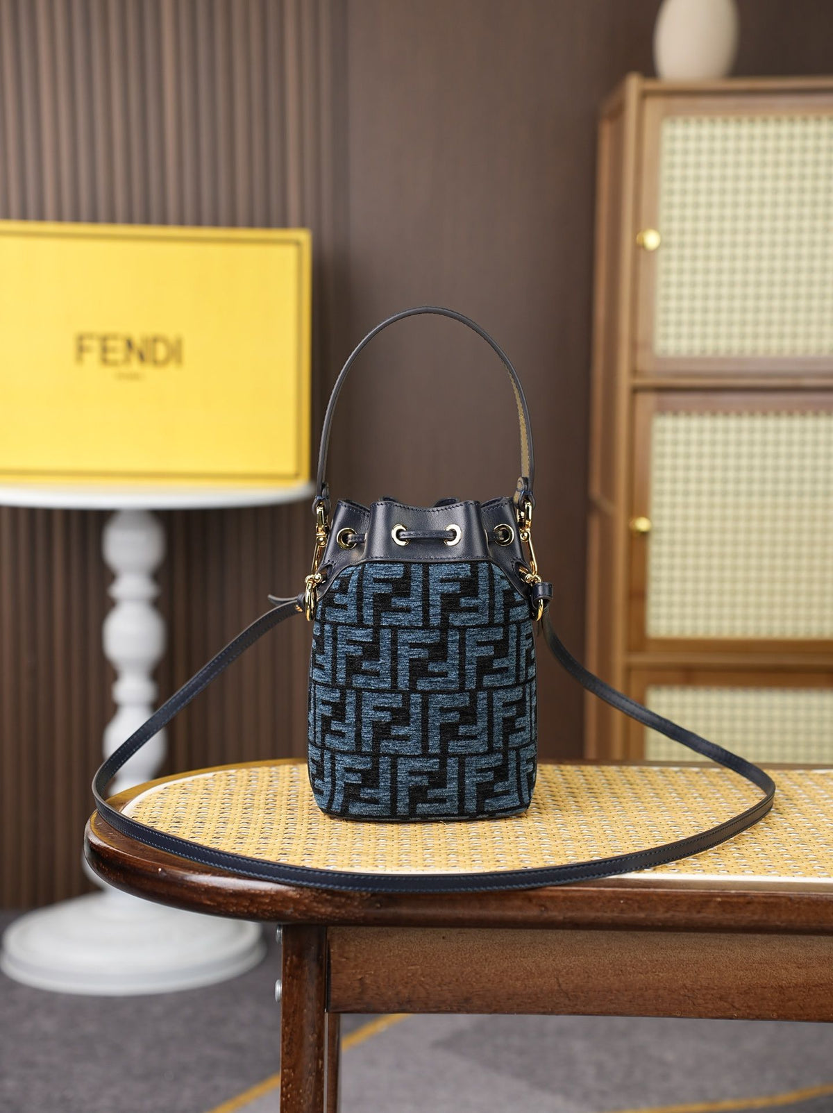 Model: 96827, Dark Blue, Size: 181210㎝. This FENDI-style MON TRÉSOR bucket bag features the iconic pigeon grey FF logo. It is highly practical for both shoulder or hand-carrying
