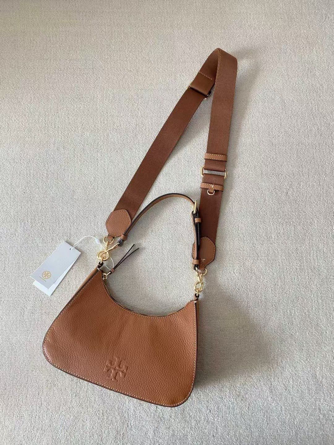 Brown capacity, large lychee grain cowhide, delicate and high-end