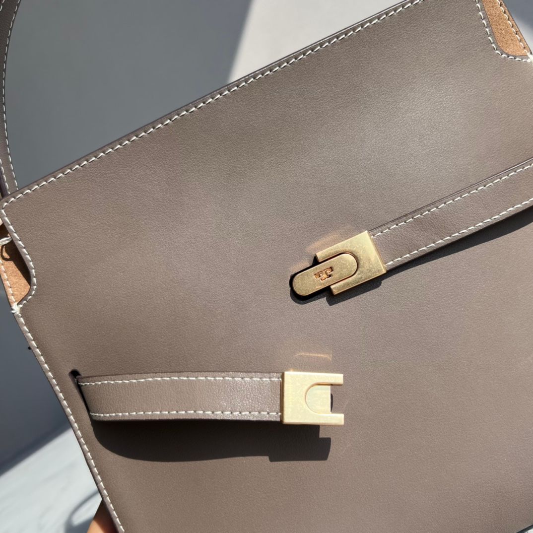 Purchasing quality 450.TB new Lee Radziwill bag with a stiff and contoured handbag shape, creating a modern and capable temperament, effortlessly showcasing fashion. Additional features include 1 middle zipper compartment, 1 zipper pocket, and a detachabl