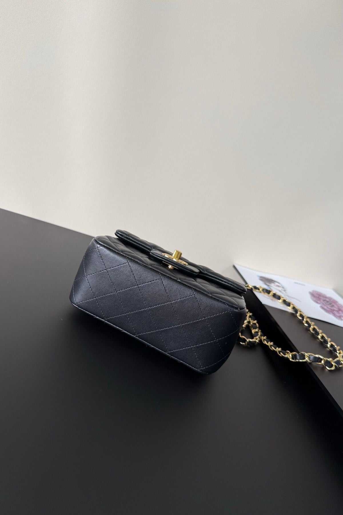Black Diamond-Quilted Mini Flap Bag with Gold-Tone Chain Strap