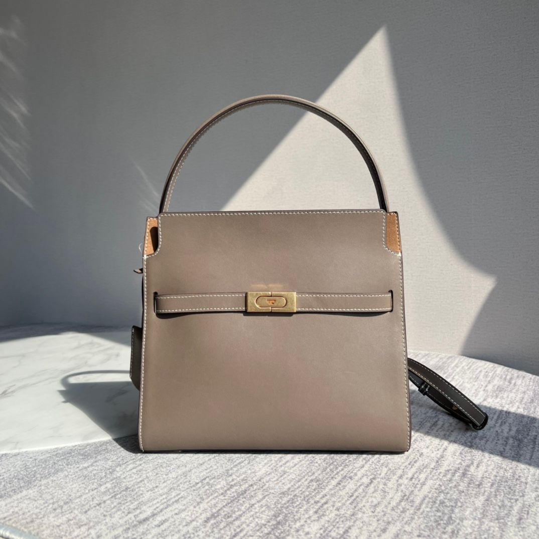 Purchasing quality 450.TB new Lee Radziwill bag with a stiff and contoured handbag shape, creating a modern and capable temperament, effortlessly showcasing fashion. Additional features include 1 middle zipper compartment, 1 zipper pocket, and a detachabl