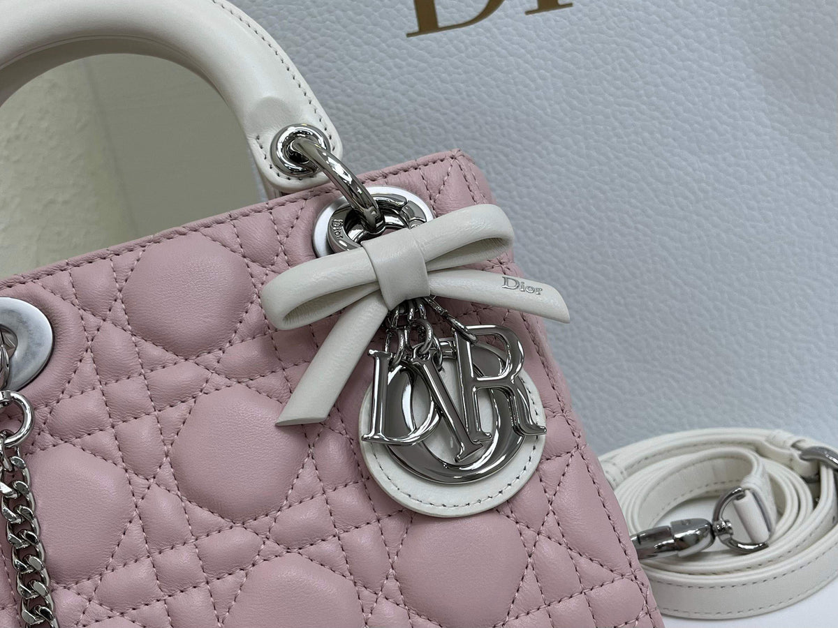Bow Lady Dior Triple Check The classic Lady Dior bag epitomizes Dior's deep insight into elegance and beauty. Carefully crafted with cannage topstitching to create eye-catching quilting details. Elegant and timeless design. D.I.O.R. charm in silver-finish