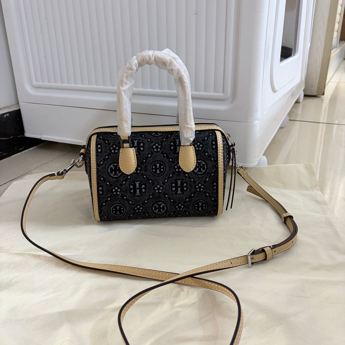 Tory Burch's T-Monogram collection of vintage Boston bags is often referred to as mini barrel bags or small handbags