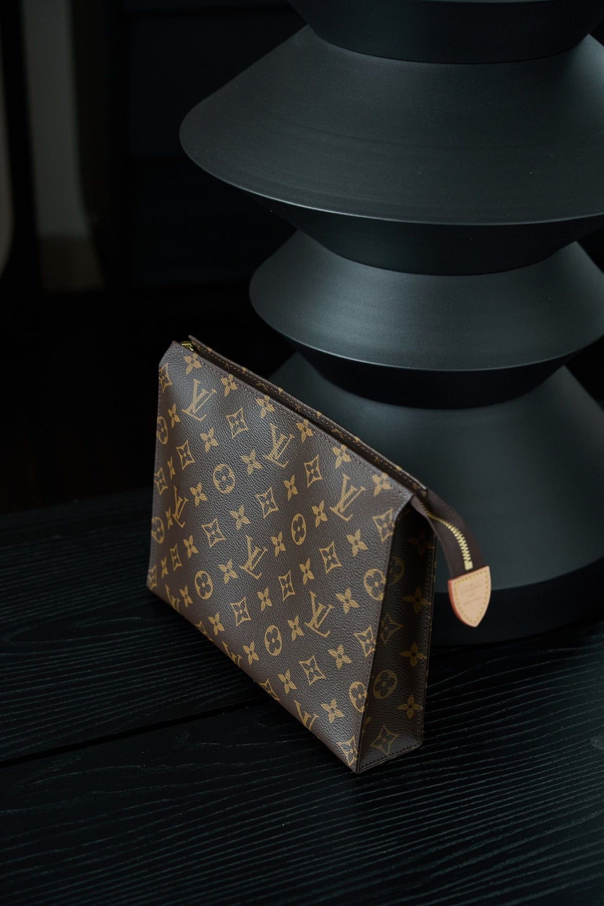 M47542 Toiletry Bag, made of original diamond pattern floral fabric, with fully steel vacuum plated hardware, priced at 980