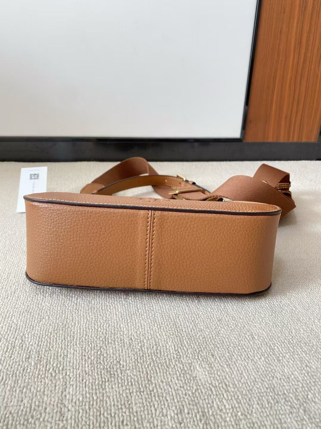 Brown capacity, large lychee grain cowhide, delicate and high-end
