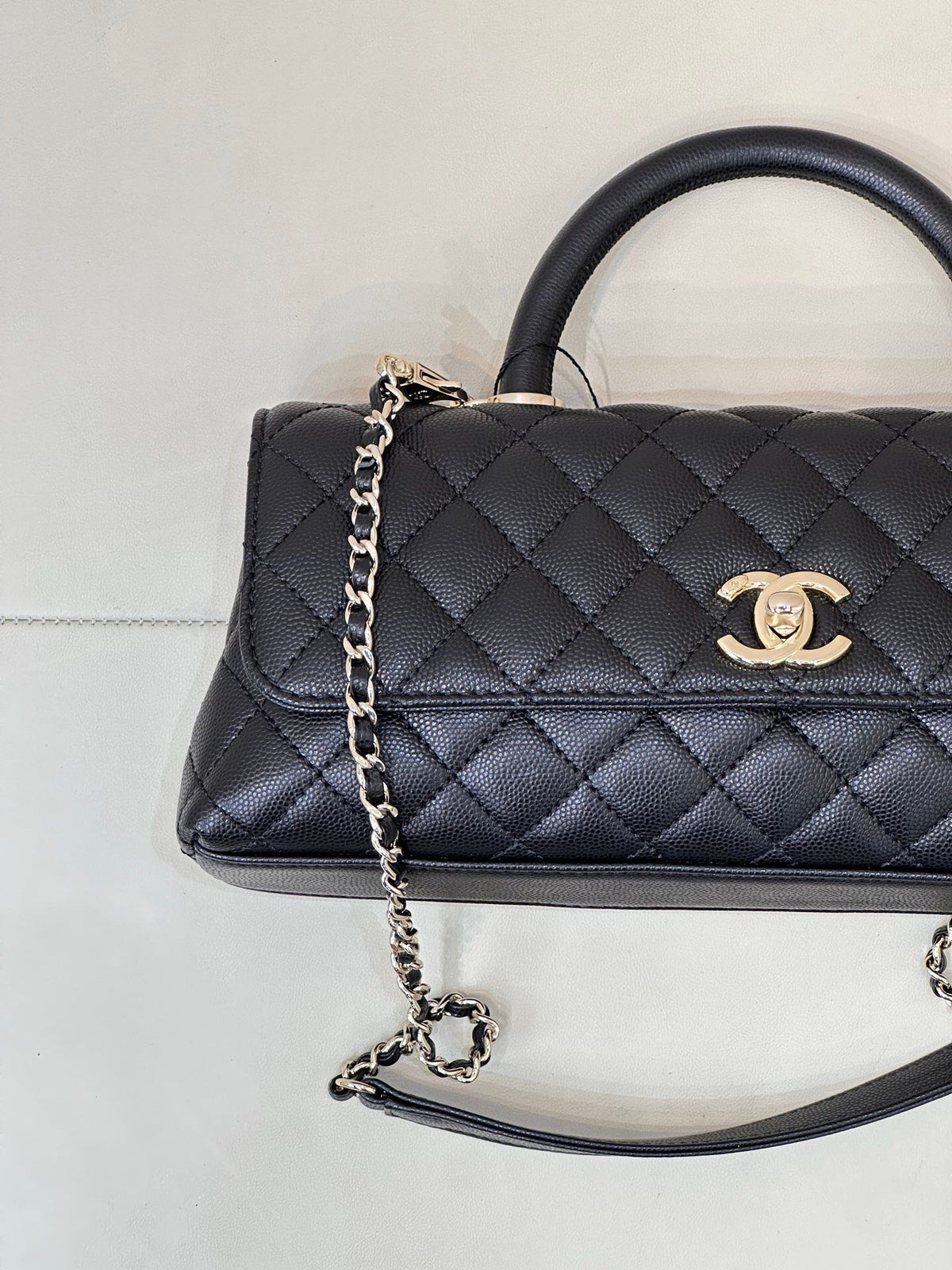 Black Quilted Top Handle Bag with Chain Strap