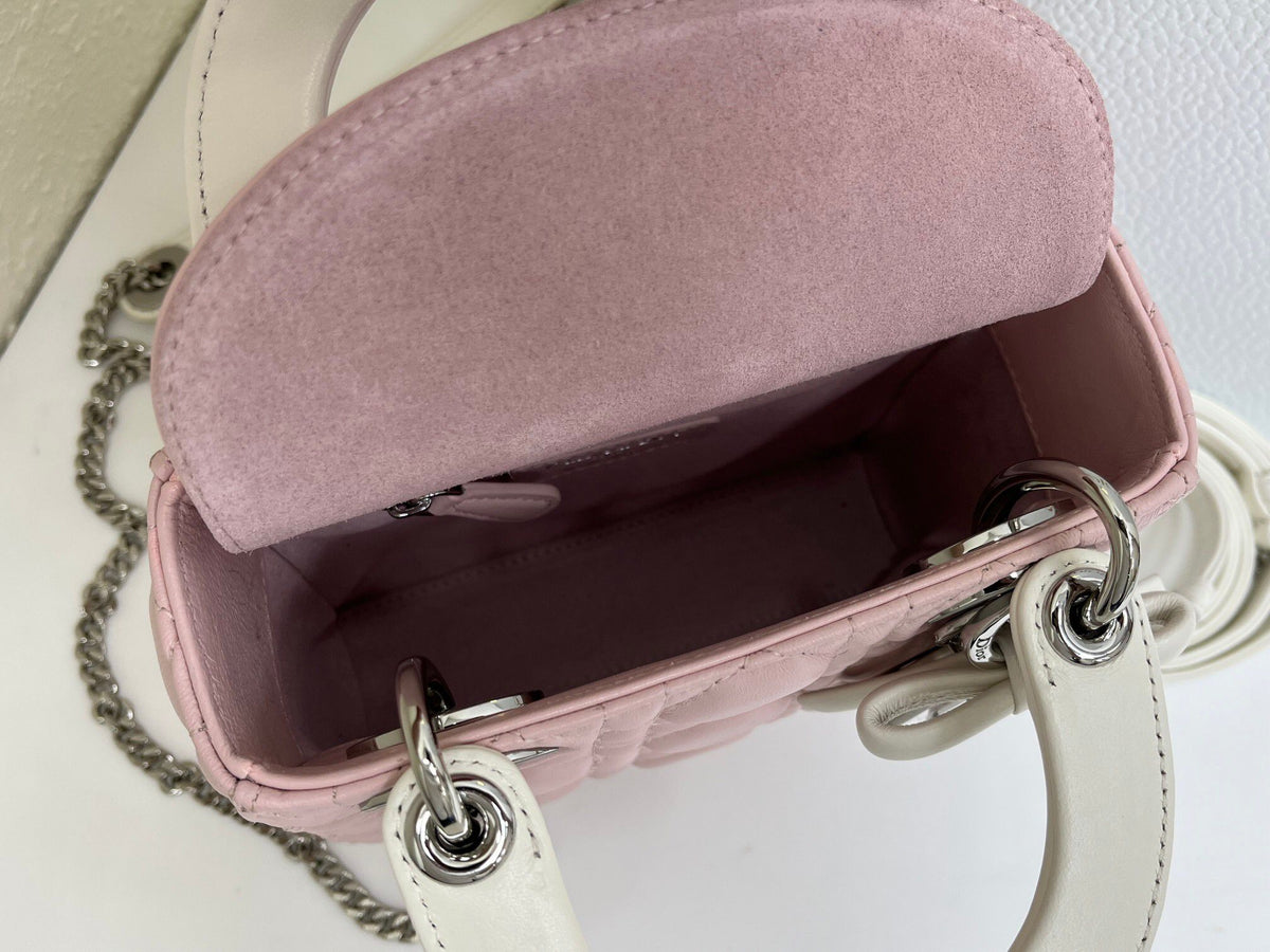 Bow Lady Dior Triple Check The classic Lady Dior bag epitomizes Dior's deep insight into elegance and beauty. Carefully crafted with cannage topstitching to create eye-catching quilting details. Elegant and timeless design. D.I.O.R. charm in silver-finish