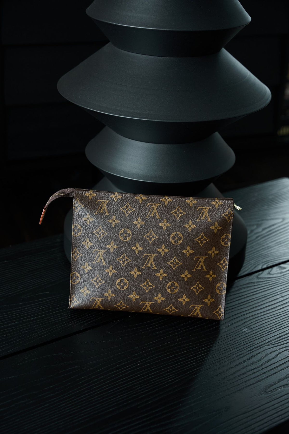 M47542 Toiletry Bag, made of original diamond pattern floral fabric, with fully steel vacuum plated hardware, priced at 980