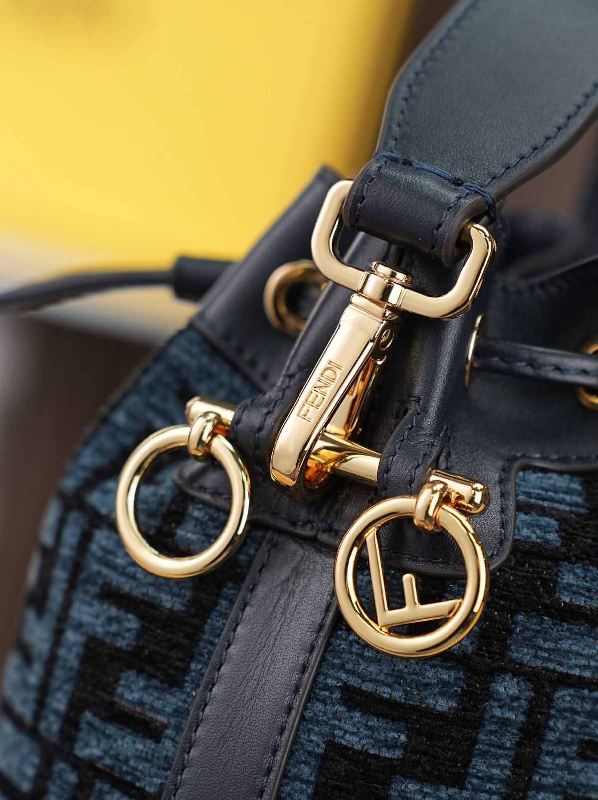Model: 96827, Dark Blue, Size: 181210㎝. This FENDI-style MON TRÉSOR bucket bag features the iconic pigeon grey FF logo. It is highly practical for both shoulder or hand-carrying