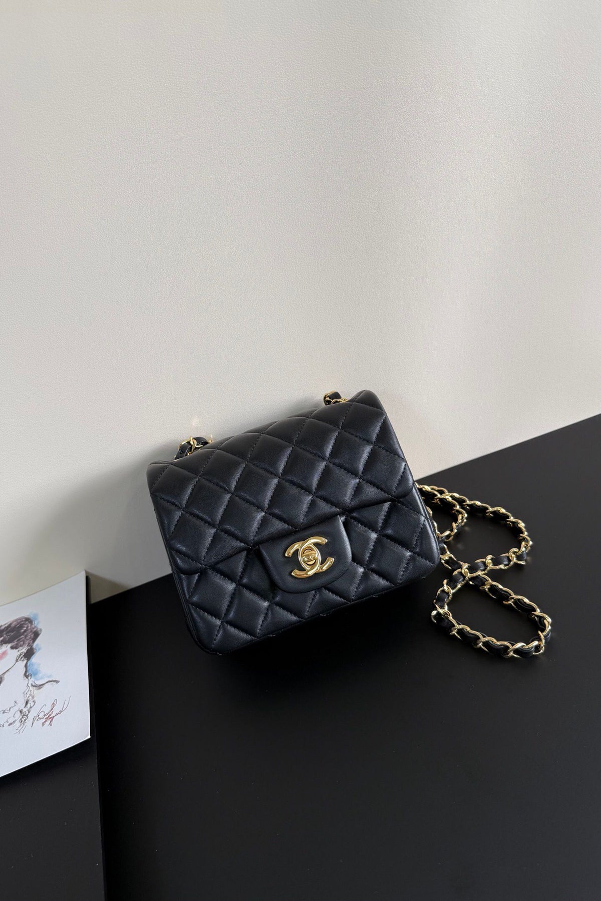 Black Diamond-Quilted Mini Flap Bag with Gold-Tone Chain Strap