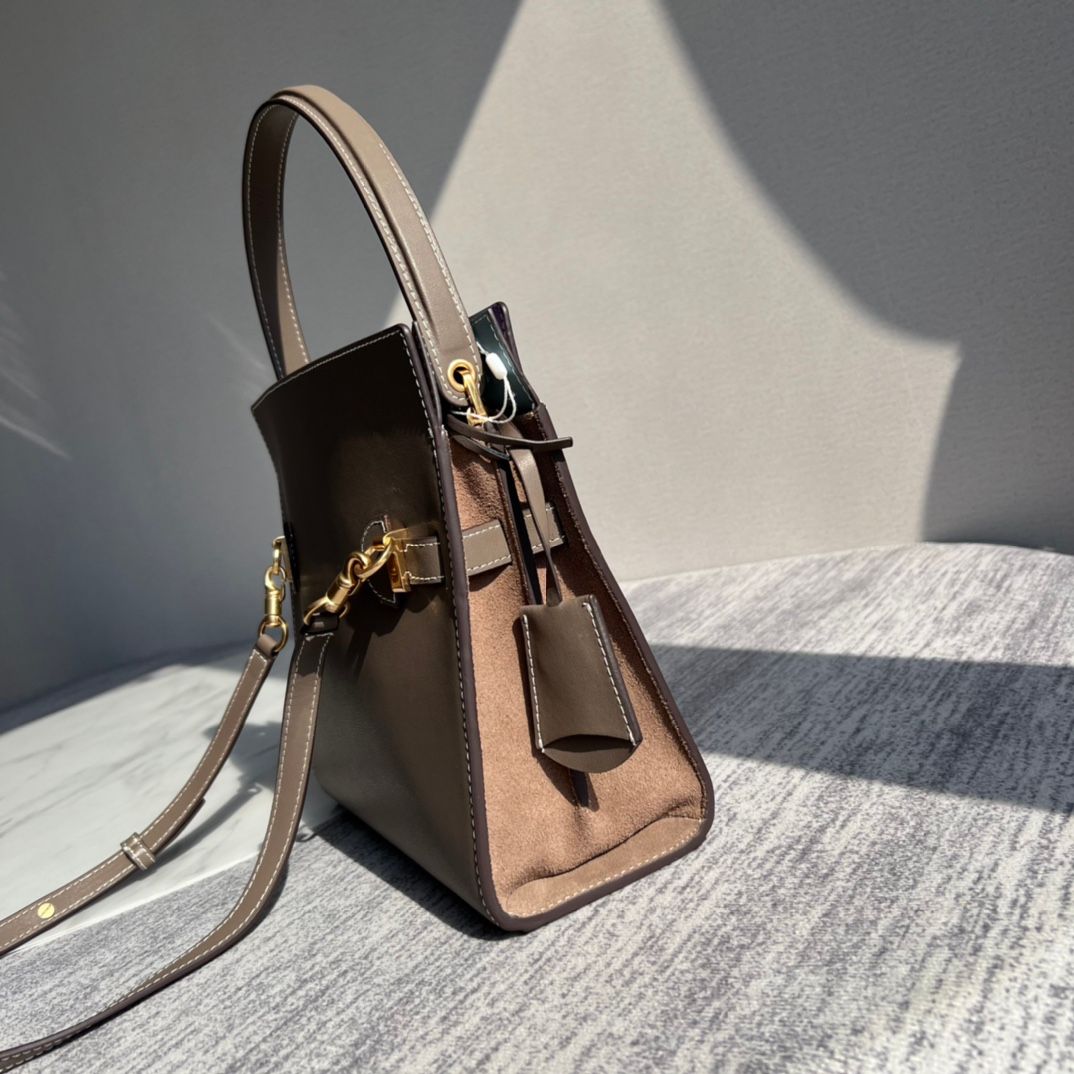 Purchasing quality 450.TB new Lee Radziwill bag with a stiff and contoured handbag shape, creating a modern and capable temperament, effortlessly showcasing fashion. Additional features include 1 middle zipper compartment, 1 zipper pocket, and a detachabl