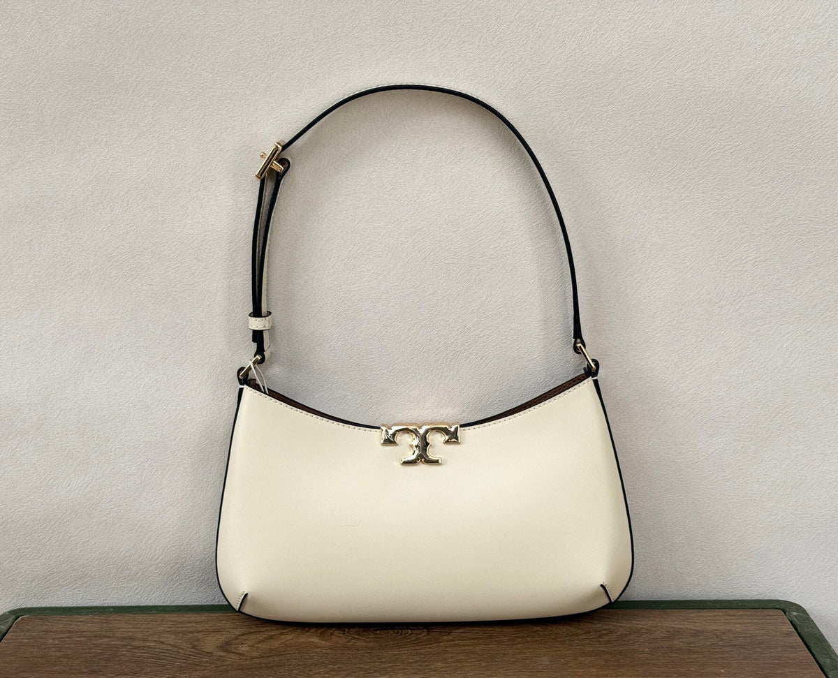 TORY BURCH ELEANOR SLIM SHOULDER BAG New armpit bag Rocket bag has ultra-thin size, upper back is not cumbersome, and it can hold necessities. It is suitable for different occasions. Pure steel hardware magnetic tape opening and closing design. The first