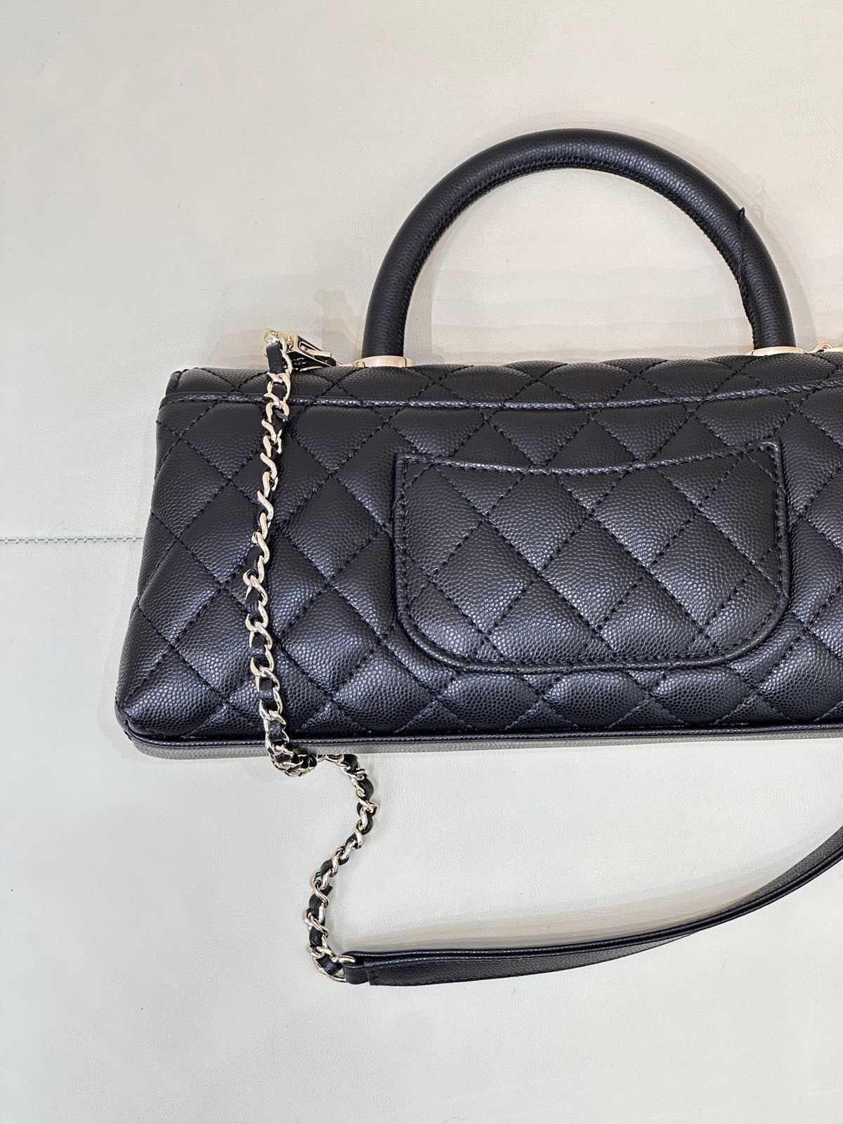 Black Quilted Top Handle Bag with Chain Strap