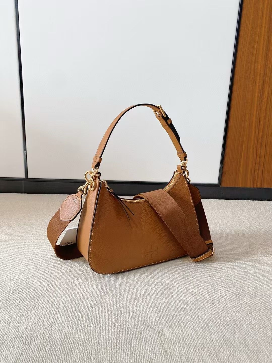 Brown capacity, large lychee grain cowhide, delicate and high-end