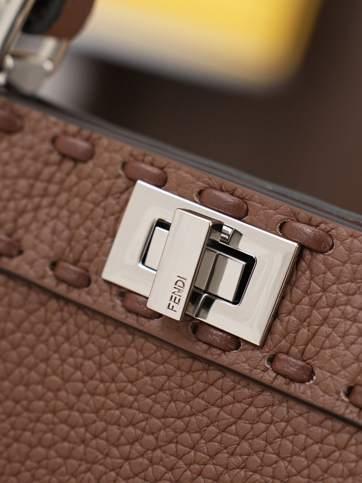 Model 15009 Caramel Brown Size 20cm Details Caramel Brown Hand sewn Peekaboo ISeeU Medium Handbag Litchi Pattern Calfskin Material with Classic Twisted Lock Soft Nappa Leather Lining on Both Sides Separated by Hard Dividers with Buckle Internal Pocket