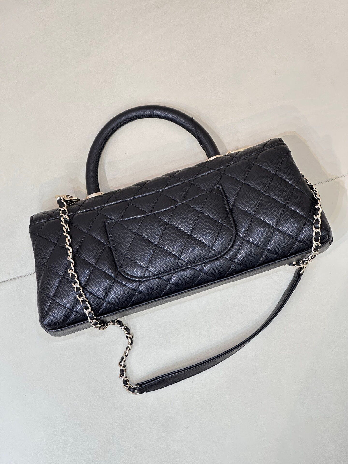 Black Quilted Top Handle Bag with Chain Strap