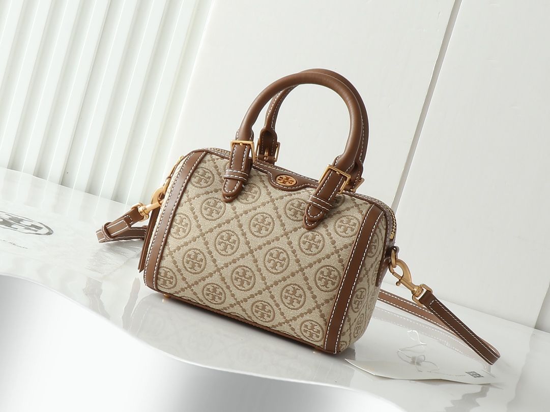 Top tier original small size in Guangzhou, original order quality, new product attention to details TORY BURCH T MONOGRAM mini jacquard wine barrel bag. This series uses woven jacquard fabric to create a charming and timeless style with unique stitching