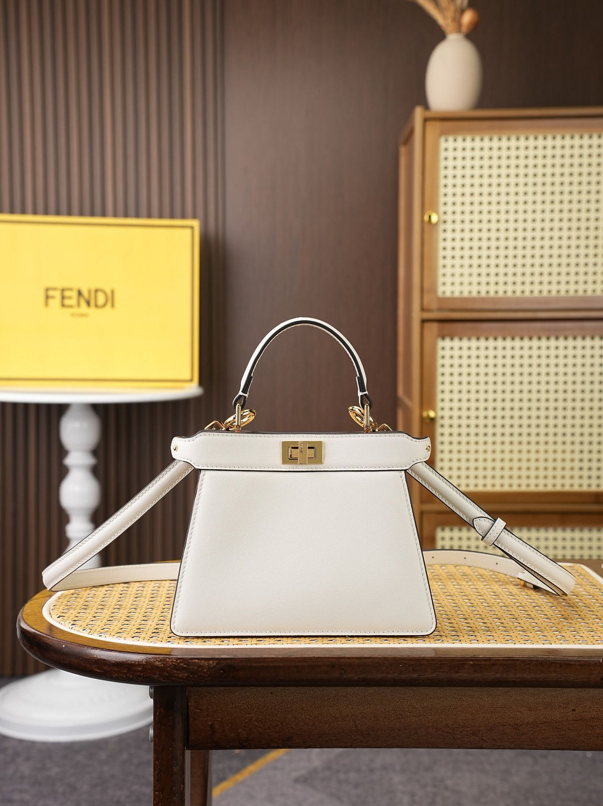 Model 8005, small size 20*11*15cm, FE ND1 "peekaboo I see u" handbag. Brand new "peekaboo I see u" is designed to showcase your unique side. The new style continues the classic trapezoidal silhouette and square twist lock design of the original "peekaboo"