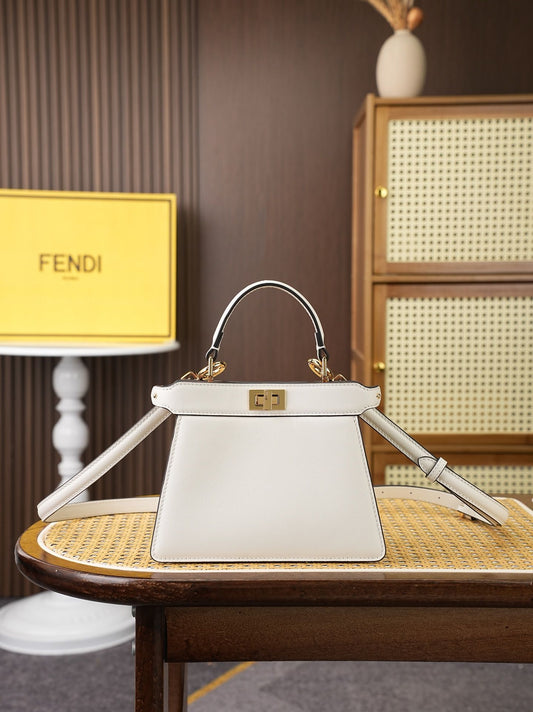 Model 8005, small size 20*11*15cm, FE ND1 "peekaboo I see u" handbag. Brand new "peekaboo I see u" is designed to showcase your unique side. The new style continues the classic trapezoidal silhouette and square twist lock design of the original "peekaboo"