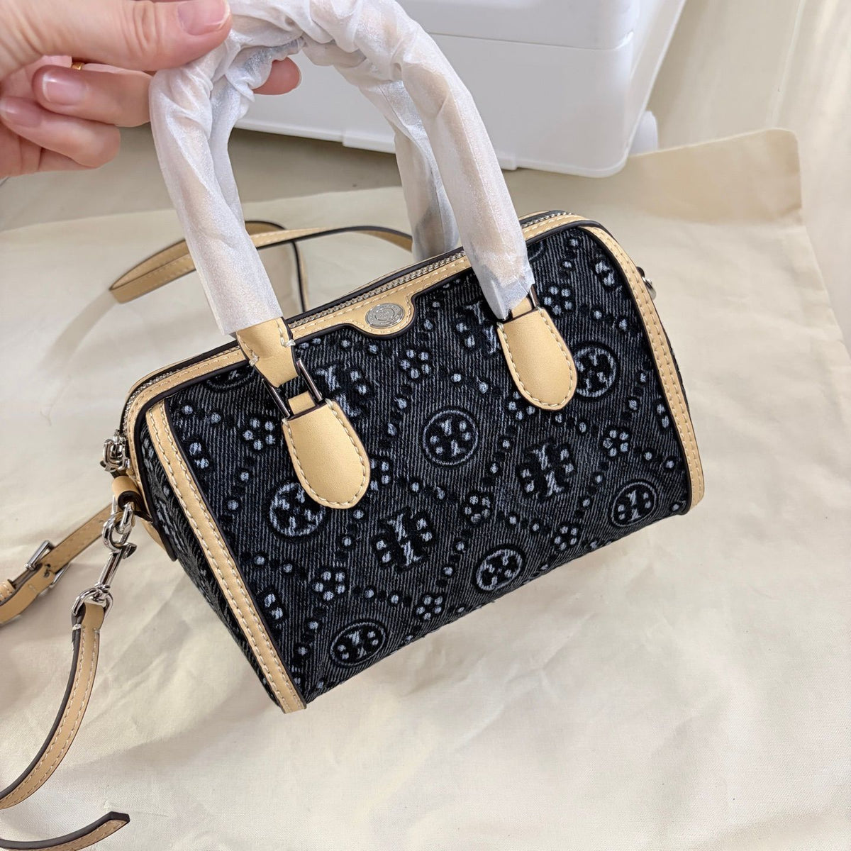 Tory Burch's T-Monogram collection of vintage Boston bags is often referred to as mini barrel bags or small handbags