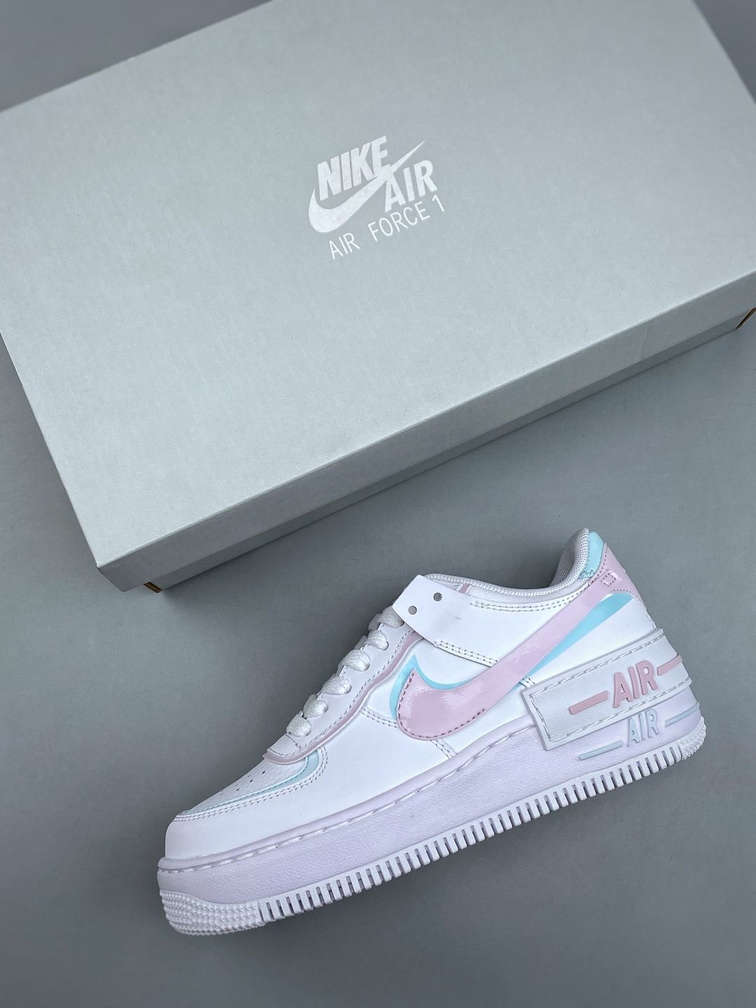 Support the launch of NIKE W AF1 SHADOW, a brand-new girly deconstructivist design. The Macaron Air Force 1 is a lightweight, height-increasing, low-top, versatile sneaker that injects playful elements into classic design. It features a layered structure